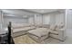 This finished basement offers plush carpet, recessed lighting, and a modular sectional sofa at 1747 Wellpark Dr, Westfield, IN 46074
