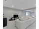 This finished basement offers carpet, recessed lighting, and a modular sectional sofa at 1747 Wellpark Dr, Westfield, IN 46074