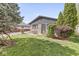 Charming stone home with lush lawn and mature trees at 1850 Cruft St, Indianapolis, IN 46203