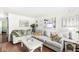 A cozy living room is furnished with a large sectional sofa, coffee table, and hardwood floors at 1850 Cruft St, Indianapolis, IN 46203