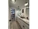 Charming bathroom with shiplap walls, dual sinks, and stylish fixtures at 1873 W 950 S, Pendleton, IN 46064