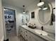 Charming bathroom with shiplap walls, dual sinks, and stylish fixtures at 1873 W 950 S, Pendleton, IN 46064