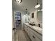 Charming bathroom with shiplap walls, dual sinks, and stylish fixtures at 1873 W 950 S, Pendleton, IN 46064