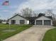 Charming home with American flag, brick accents, and two-car garage at 1873 W 950 S, Pendleton, IN 46064