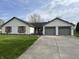 Charming home with brick accents, well-manicured lawn, and two-car garage at 1873 W 950 S, Pendleton, IN 46064