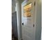 Charming white pantry door with glass window and vintage-style lettering adding character to the kitchen space at 1873 W 950 S, Pendleton, IN 46064