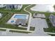 A top-down shot of a neighborhood pool, park, and clubhouse, highlighting community amenities at 1979 Lunenburg Dr, Westfield, IN 46074