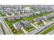 A real estate view showcasing houses in a planned community with green spaces and proximity to community pond at 1979 Lunenburg Dr, Westfield, IN 46074