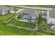 Bird's-eye view of a home with a fenced yard and patio, located in a community with sidewalks and landscaping at 1979 Lunenburg Dr, Westfield, IN 46074