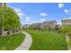 Spacious backyard with well-manicured lawn and charming landscaping at 1979 Lunenburg Dr, Westfield, IN 46074