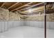 Unfinished basement with exposed ceiling and concrete walls at 1979 Lunenburg Dr, Westfield, IN 46074