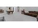 Finished basement with plush carpeting and a pool table, perfect for entertainment at 1979 Lunenburg Dr, Westfield, IN 46074