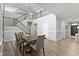 Dining room featuring staircase, wood floors and spacious seating at 1979 Lunenburg Dr, Westfield, IN 46074