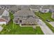 Well-maintained two-story home with a beautifully landscaped yard, covered porch and two car attached garage at 1979 Lunenburg Dr, Westfield, IN 46074