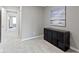 Hallway featuring gray carpet, a painting of the sea, and an entrance to other rooms at 1979 Lunenburg Dr, Westfield, IN 46074