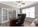 Spacious office featuring a large desk and double doors for privacy at 1979 Lunenburg Dr, Westfield, IN 46074