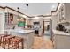 Modern kitchen with marble countertops, stainless appliances, custom cabinets and tiled backsplash at 2011 Pin Oak Ct, Indianapolis, IN 46260
