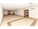 Expansive finished basement featuring a rec area, bar and plenty of open space at 2308 Galahad Dr, Indianapolis, IN 46228