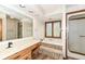 Bathroom boasts a large tub with steps, a vanity, and a separate shower at 2308 Galahad Dr, Indianapolis, IN 46228