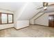 Bedroom with a ceiling fan and a window letting in natural light at 2308 Galahad Dr, Indianapolis, IN 46228