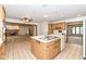 Open-concept kitchen showcasing an island, ample counter space, and seamless transition to the living areas at 2308 Galahad Dr, Indianapolis, IN 46228