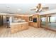 Spacious kitchen features custom wood cabinets, stainless steel appliances, and a bright, tiled floor at 2308 Galahad Dr, Indianapolis, IN 46228