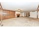 Bright living room showcases a fireplace, built-in shelving, and an open floorplan at 2308 Galahad Dr, Indianapolis, IN 46228