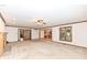 Large living room featuring a fireplace and a seamless transition to other areas of the home at 2308 Galahad Dr, Indianapolis, IN 46228