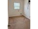 Comfortable bedroom with neutral carpet and a window for natural light and ventilation at 2632 Walker Ave, Indianapolis, IN 46203
