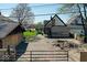 View of a backyard showcasing exterior structures and open space, indicating the property layout at 3320 E New York St, Indianapolis, IN 46201