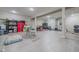 Spacious basement with light vinyl floors, exercise equipment, storage, and room for activities at 358 W Tansey Xing, Westfield, IN 46074