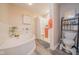 Bright bathroom featuring a glass-enclosed shower, soaking tub, and toilet with -size seat at 358 W Tansey Xing, Westfield, IN 46074