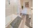 Well-lit bathroom featuring a glass-enclosed shower and soaking tub at 358 W Tansey Xing, Westfield, IN 46074