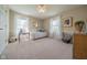 Sun-filled bedroom with natural light featuring two windows and neutral decor at 358 W Tansey Xing, Westfield, IN 46074