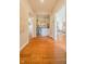 Hallway leading to a bar, living room, and other rooms in the house at 358 W Tansey Xing, Westfield, IN 46074