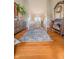 Spacious hallway with hardwood floors and an alcove featuring a bar at 358 W Tansey Xing, Westfield, IN 46074