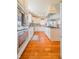 Well-equipped kitchen featuring white cabinets, stainless steel appliances and granite countertops at 358 W Tansey Xing, Westfield, IN 46074