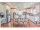 Spacious kitchen with white cabinets, granite countertops, stainless steel appliances and a center island at 358 W Tansey Xing, Westfield, IN 46074
