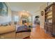 Inviting living room featuring a fireplace, shelving, and comfortable seating at 358 W Tansey Xing, Westfield, IN 46074