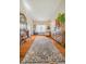 Spacious living room with hardwood floors and lots of seating, with natural light at 358 W Tansey Xing, Westfield, IN 46074