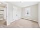 Cozy bedroom with carpet, closet, and natural light from the window at 3826 Delaware St, Anderson, IN 46013
