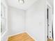 Small room with wood floors, window, and neutral wall paint at 3826 Delaware St, Anderson, IN 46013
