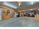 Large garage offering parking and storage, with a variety of tools and equipment visible at 4013 Colonial Dr, Anderson, IN 46012