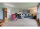 Inviting living room features a comfortable gray sectional sofa and classic decor at 4013 Colonial Dr, Anderson, IN 46012