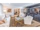 Elegant living room featuring hardwood floors, neutral furniture, and refined decor at 411 Sugar Tree Ln, Indianapolis, IN 46260