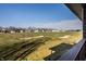 A view from the balcony shows the well manicured golf course and luxury homes in the neighborhood at 4292 Alderborough Way, Zionsville, IN 46077