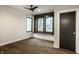 Bedroom with a window bench, dark trim and a ceiling fan at 4292 Alderborough Way, Zionsville, IN 46077