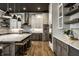 Expansive kitchen featuring two-tone cabinetry, stainless steel appliances, and a large island with bar seating at 4292 Alderborough Way, Zionsville, IN 46077