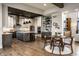 Kitchen and breakfast nook with hardwood flooring and stainless steel appliances at 4292 Alderborough Way, Zionsville, IN 46077