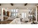 Bright and airy living room featuring modern furnishings, wood floors, and expansive windows at 4292 Alderborough Way, Zionsville, IN 46077